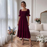 Smocked Bodice Midi Dress with Long Sleeves and Flowing Tiered Skirt