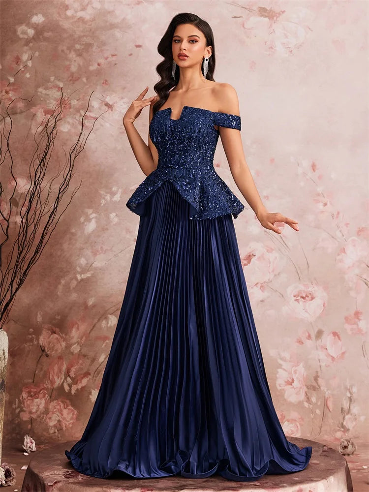Off the Shoulder Sequin Peplum Gown with Pleated Skirt