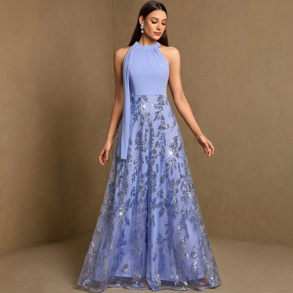 Dream Designs Boutique shimmering blue sequined fit-and-flare evening gown with floral lace.