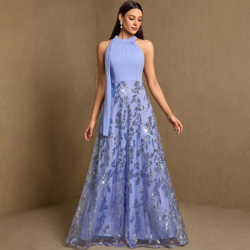 Dream Designs Boutique shimmering blue sequined fit-and-flare evening gown with floral lace.
