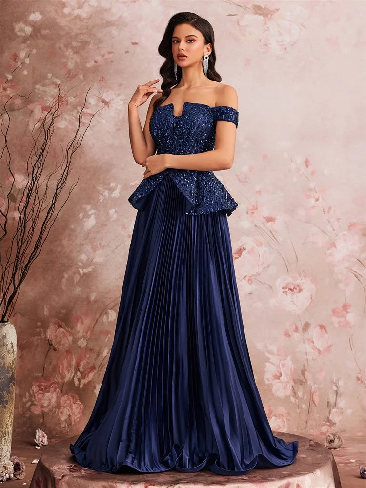 Off the Shoulder Sequin Peplum Gown with Pleated Skirt