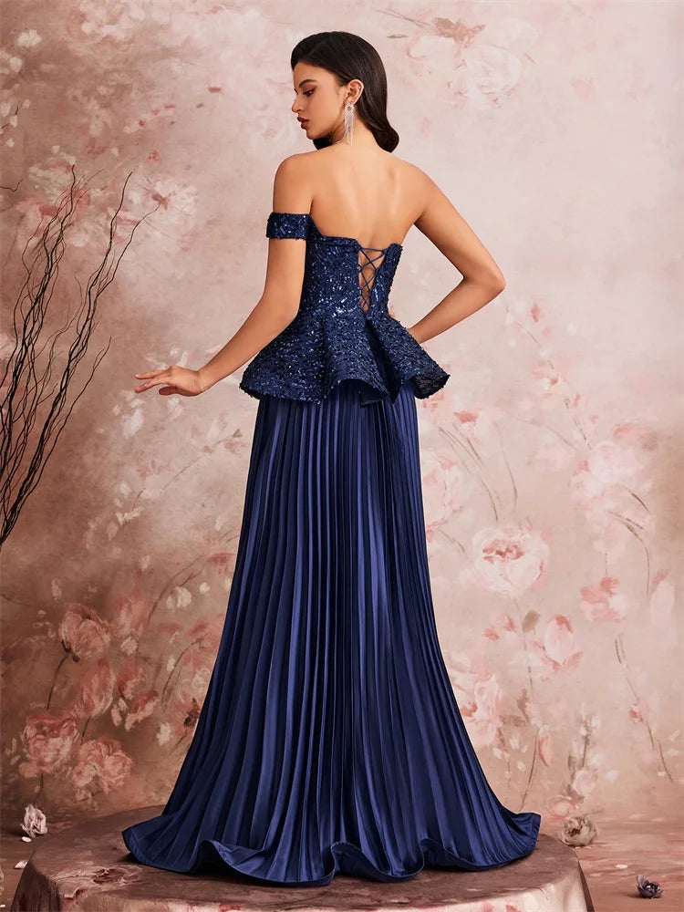 Off the Shoulder Sequin Peplum Gown with Pleated Skirt