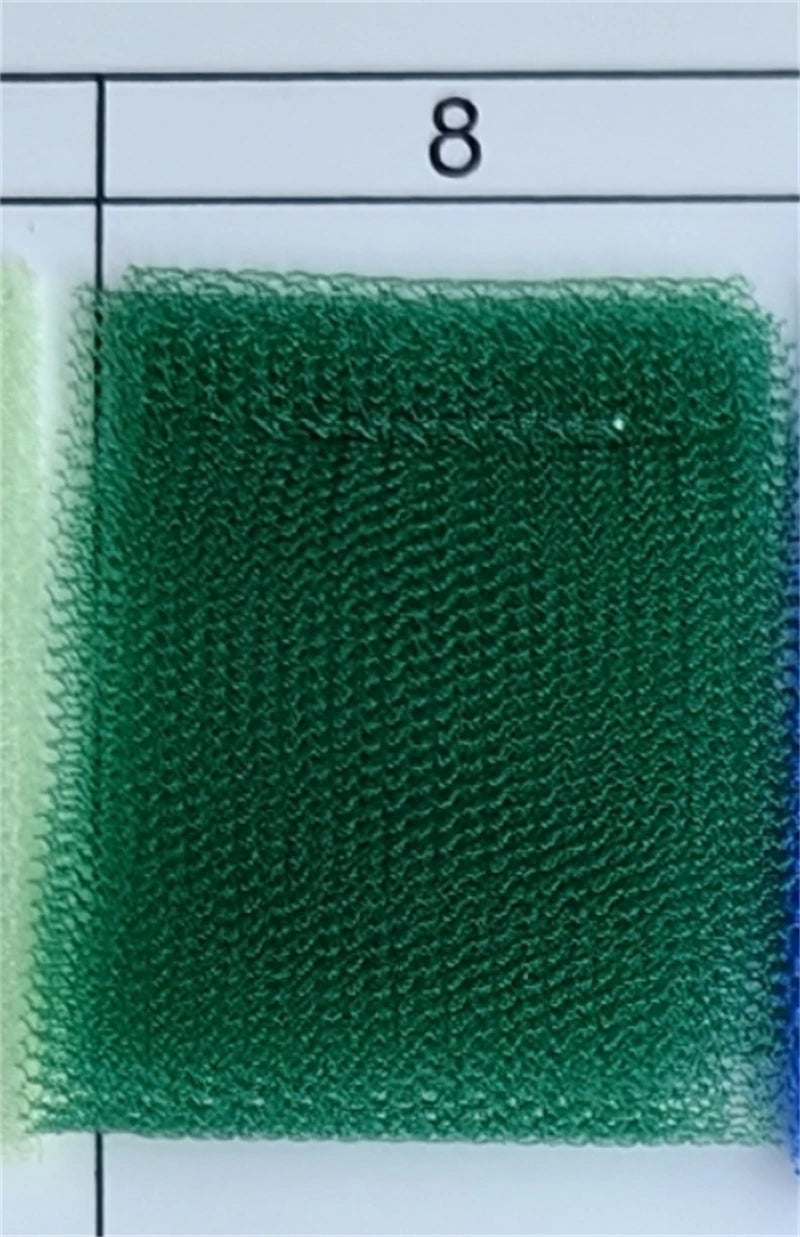 Close-up of green mesh fabric swatch from AliExpress.
