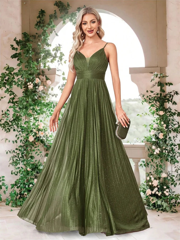 Woman wearing an elegant deep V-neck olive green chiffon A-line evening gown by Dream Designs Boutique