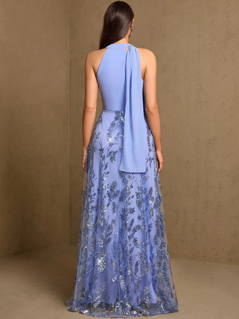 Back view of a Dream Designs Boutique blue halter evening gown with silver floral sequins.