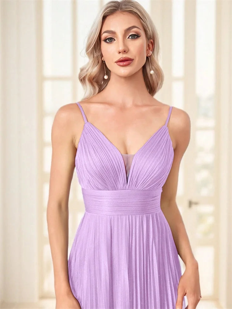Dream Designs Boutique lavender chiffon A-line evening gown with a deep V-neck.