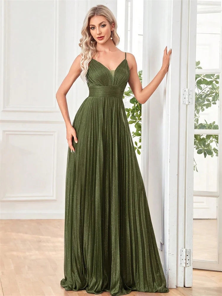 Woman wearing an elegant deep V-neck olive green chiffon A-line evening gown by Dream Designs Boutique