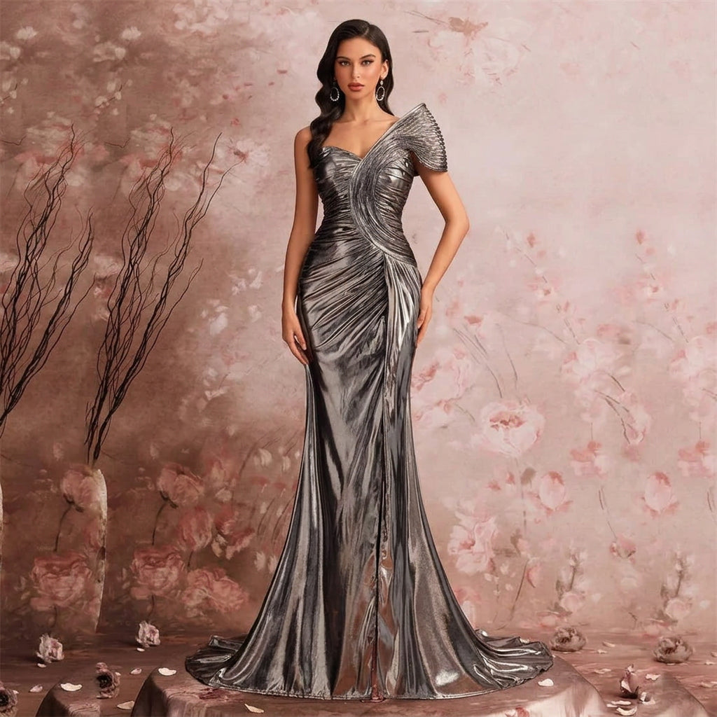 Woman wearing an AliExpress metallic satin one-shoulder mermaid gown with sculptural pleating.
