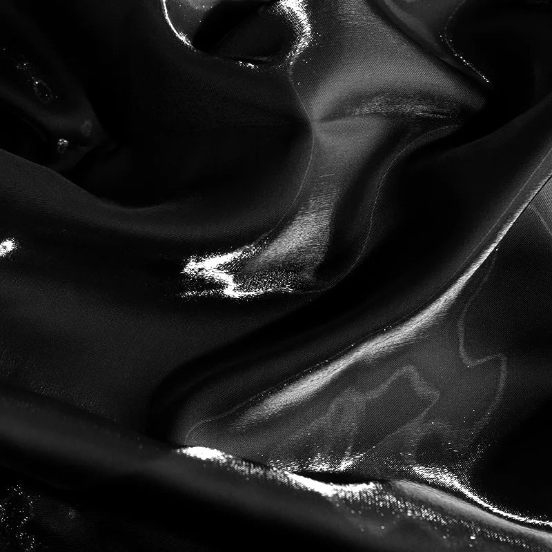 Shiny black satin fabric texture for a spaghetti strap corset evening gown.