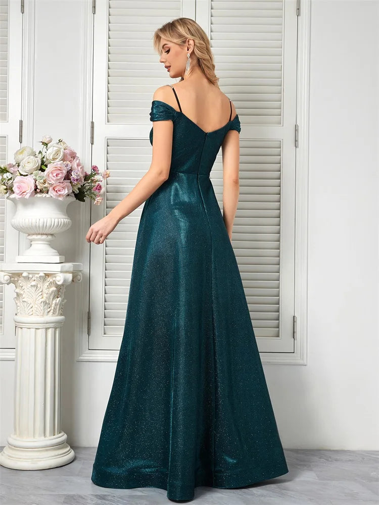 Sparkly beaded teal A-line evening gown with an open back by Dream Designs Boutique