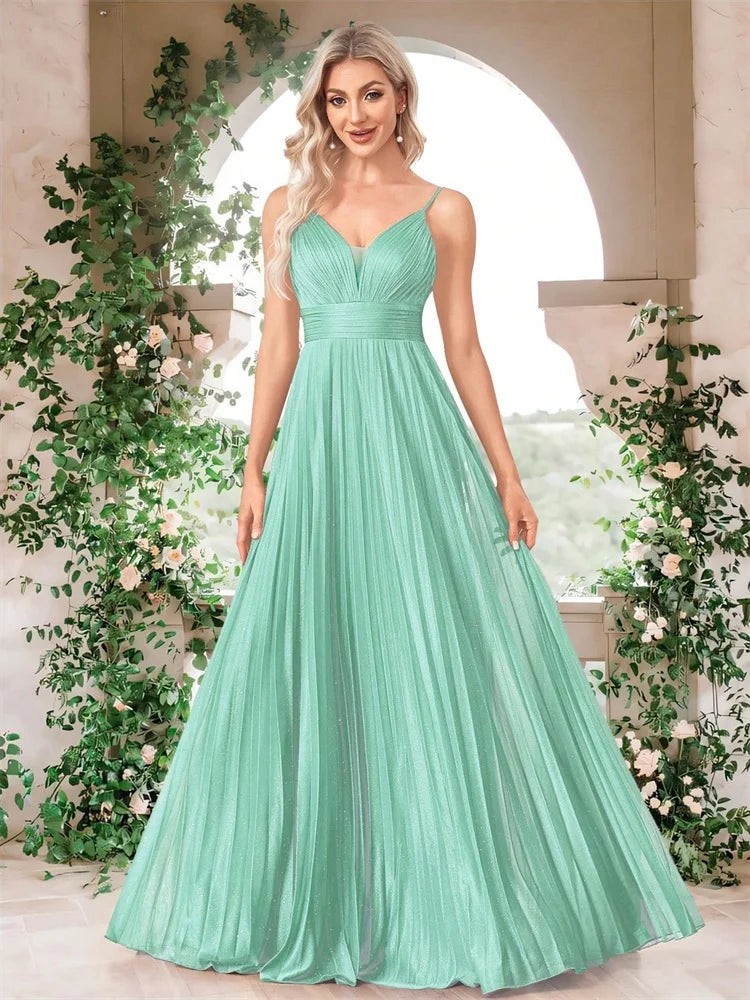 Mint green chiffon A-line evening gown with a deep V-neck by Dream Designs Boutique