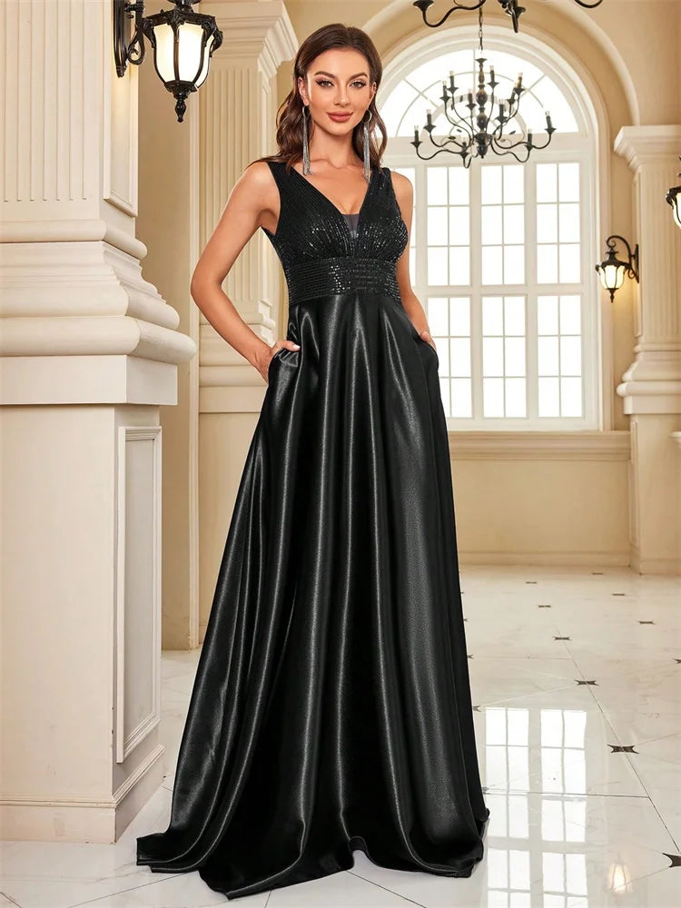 Dream Designs Boutique black sequined V-neck A-line evening gown with pockets
