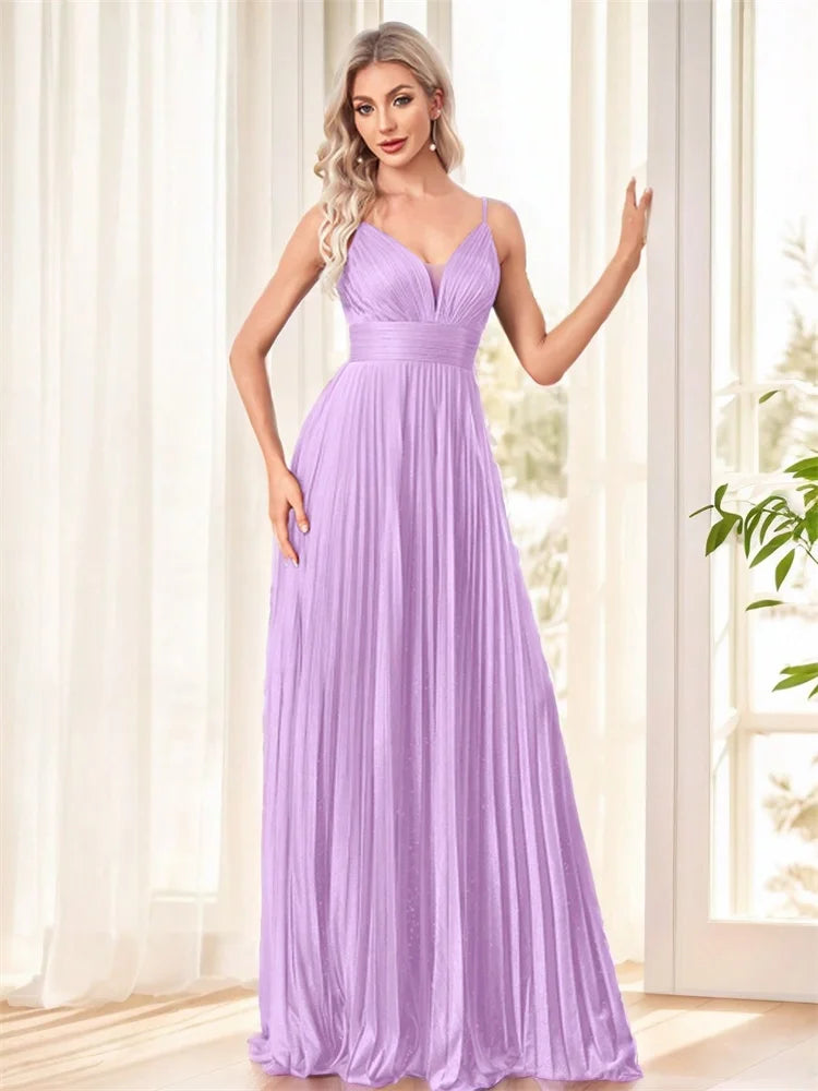 Woman wearing an elegant lavender deep V-neck chiffon A-line evening gown by Dream Designs Boutique