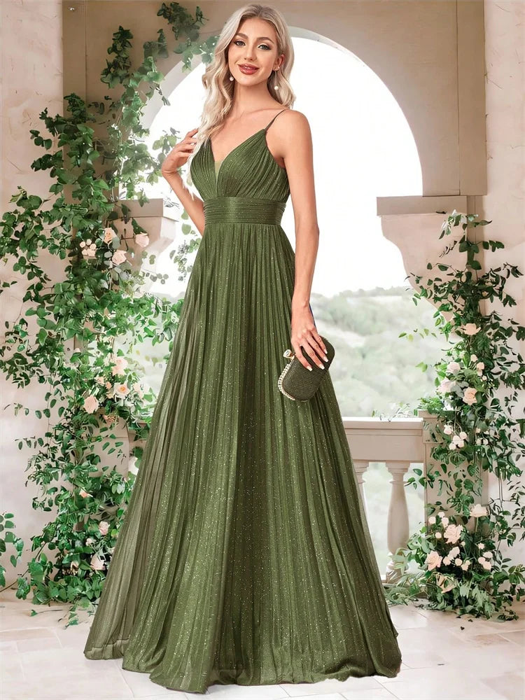 Woman wearing an elegant deep V-neck olive green chiffon A-line evening gown by Dream Designs Boutique
