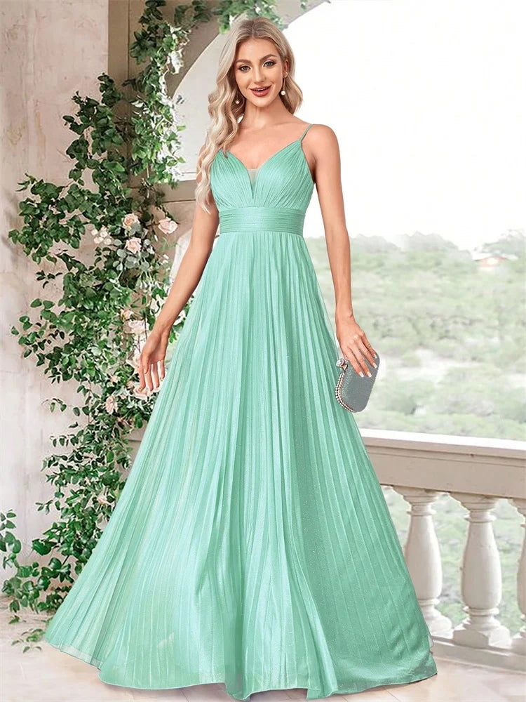 Mint green deep V-neck chiffon A-line evening gown by Dream Designs Boutique