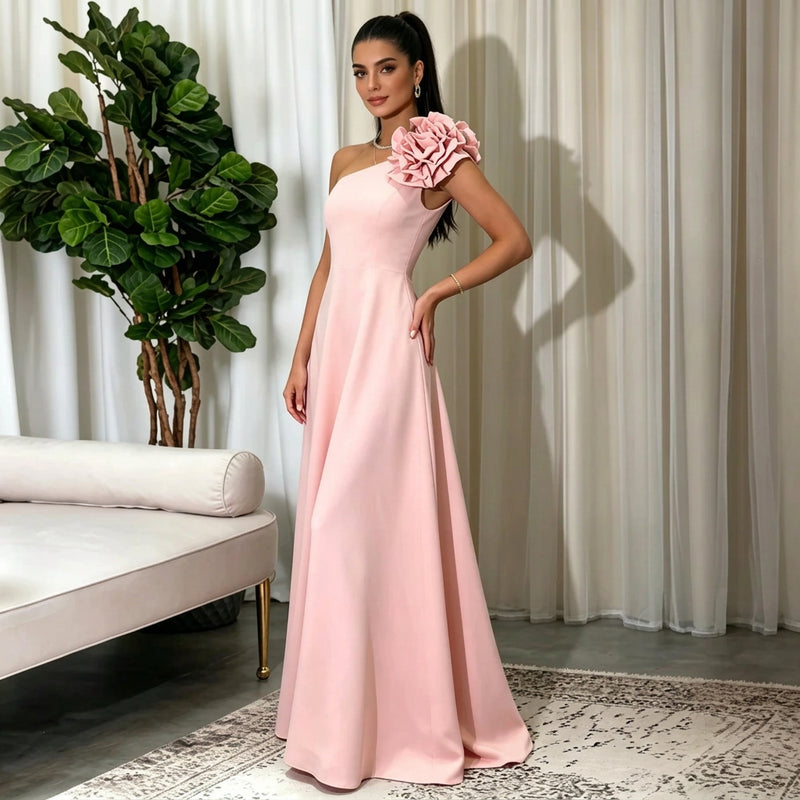 Woman in pink one shoulder A-line evening gown with 3D flower detail by AliExpress