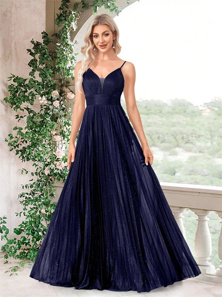 Woman wearing an elegant deep V-neck navy blue chiffon A-line evening gown.