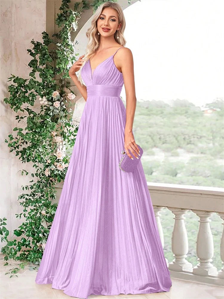 Woman wearing an elegant lavender deep V-neck chiffon A-line evening gown by Dream Designs Boutique