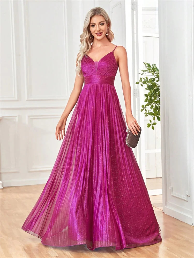 Dream Designs Boutique magenta chiffon A-line evening gown with deep V-neck.