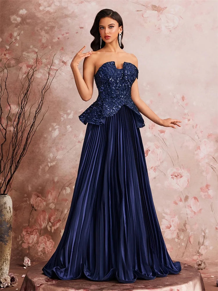 Off the Shoulder Sequin Peplum Gown with Pleated Skirt