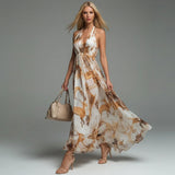 Printed Halter Maxi Dress with Ruching and Flowing Skirt