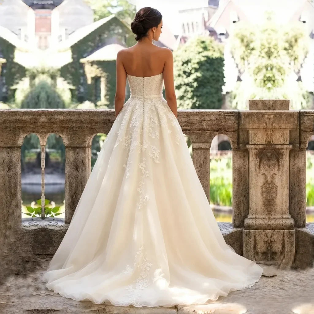 Back-view wedding gown photo with watermark removal in progress