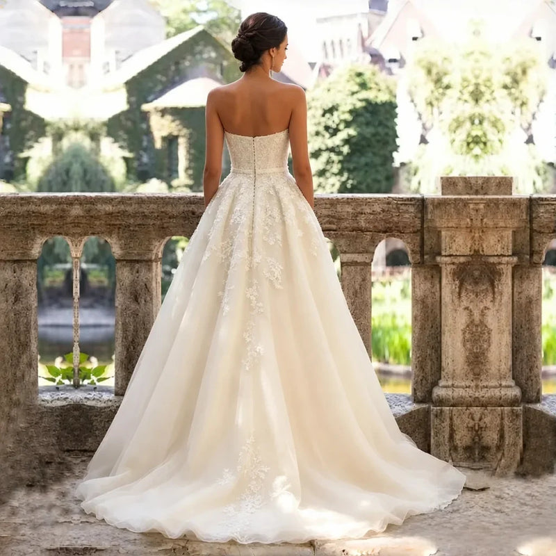 Back-view wedding gown photo with watermark removal in progress